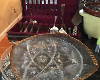 Silverplate and glass plates.