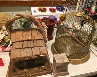 Bird cage and garden ornaments.