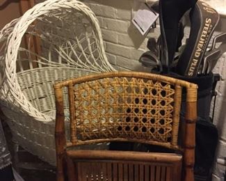 Wicker bassinet and folding cane chair.