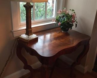 Cherry table with lamp.