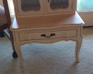 One of a pair of nightstands.  One has been painted so they are ready to be painted to fit in with your decor