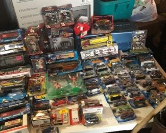 Toy Cars, Harley Davidson motorcycles, and miscellaneous bags