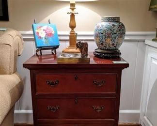 One of a pair of vintage 3-drawer mahogany chests, one of the pair of sienna marble table lamps, one of a pair of snazzy light blue cloisonne urns, original oil on canvas by Atlanta artist and vintage onyx ashtray with brass elephant standing guard of your smoking addiction. 