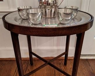 Vintage mahogany tray table, with pewter serving tray.