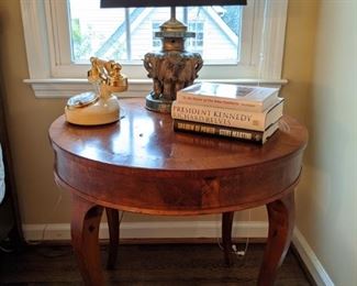 Vintage French walnut side table, with Hollywood agent telephone and 3-elephant elephant lamp. 