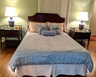 Queen size mahogany bed, with pair of Baker nightstands and cloisonne table lamps, with shades, finals and acrylic bases,.