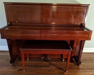 Absolutely pristine 1974 Steinway upright piano, model #45 (signed by Henry Steinway) with matching stool.