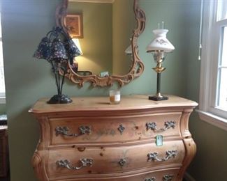 Hand painted Frenchy bombé chest, with matching wall mirror.