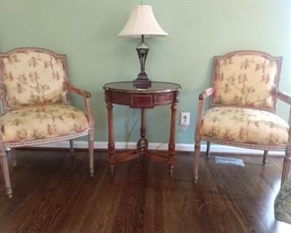 Everyone loves a nice pair, especially when it's a pair of French bergere chairs! Lovely 3-legged round table, with brass mounts and sunburst top inlay.