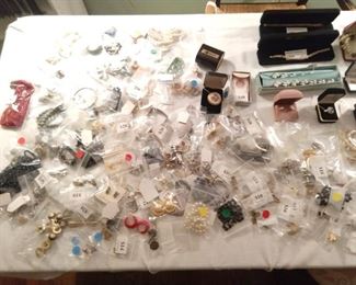 Heaps of good costume jewelry - who knows, we're really dumb and I'm sure there's 14K gold, platinum and sterling items we just didn't see...                                                 ;-)