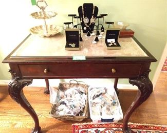 Vintage carved mahogany claw-foot desk (beveled glass top) with single drawer and matching side chair. 