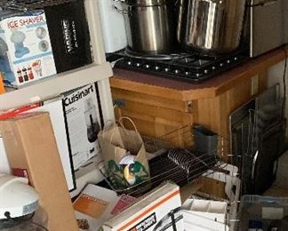 Lots of NIB household items, kitchenware, decorative elements. 