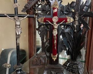 Very large selection of Crucifixes, a collection from around the world.  Some of the crucifixes are no longer available, Client has removed several . 