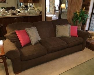 Brown upholstered couch