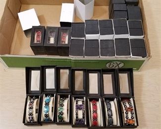 25 assorted bracelets in display boxes