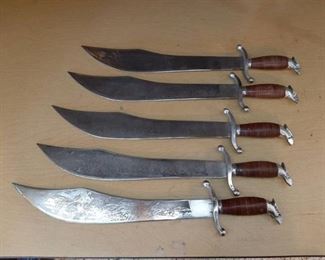 5 large knives with etched blades