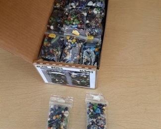 Approximately 66 bags glass beads