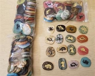 large assortment of etched polished stones