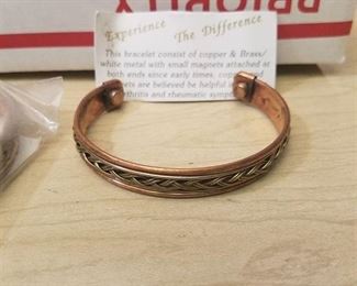 12 copper and brass bracelets