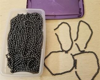 tote full of 8 mm round stranded jewelry beads