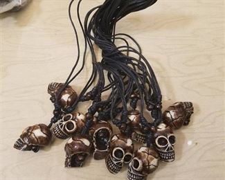 approximately 100 skull necklaces