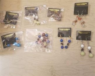 approximately 100 Pair of earrings Haitian semi-precious stones