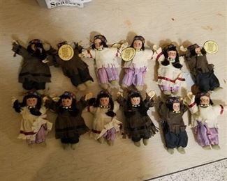 12 small Native american dolls