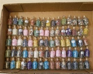 approximately 75 small gemstone bottles