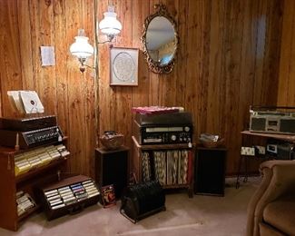 Several stereos. LPs, 8-tracks and cassettes