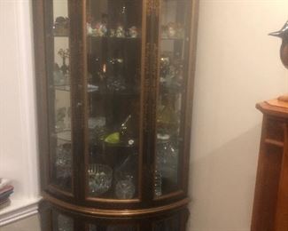 This is a beautiful hand painted and lacquer showcase with glass shelves. It lights up to beautifully display any collectable or heirloom! $500.00
