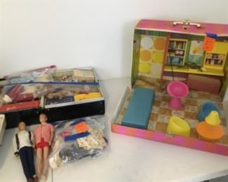 Vintage Barbie & Ken dolls, cases, and accessories.