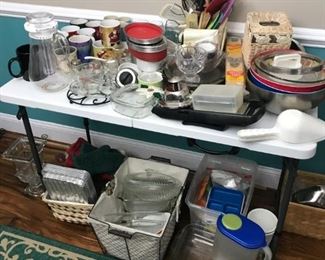Variety of kitchen glassware, bowls, dish sets and storage. 
