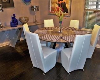 Chrome and marble dining table with white leather chairs with matching console table