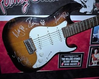 Signed Samick Malibu electric guitar by all 4 members of the Rolling Stones