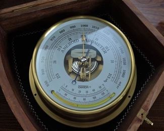 Oakton Aneroid barometer in wood and brass display case