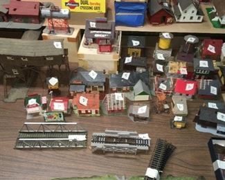 HO train equipment, tracks, cars, houses, etc., for complete model setup. 