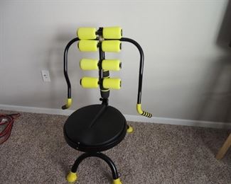 Exercise chair with massage rollers.