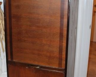 Roos cedar-lined wardrobe - a beautiful roll-top cedar wardrobe, certainly one of the most unusual pieces of furniture we've come across. For its age, it's in great condition.