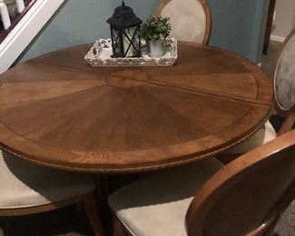 Wow! THIS 6 setting table is the real deal! It is incredibly sturdy, solid, and heavy. It is real wood. This is the mother of all tables. The chairs have been professionally cleaned (not that they needed it!). We also have another leaf for this. It is a SIX CHAIR PIECE! See dimensions below:
1 leaf: 17.5 inches wide
54 inches across (without leaf)
6 chairs total
Asking $650 for table, leaf, chairs or best offer