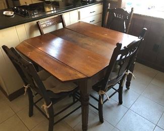 Walnut table and 5 chairs