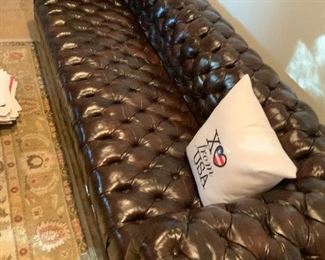 Leather couch, cat damage $100