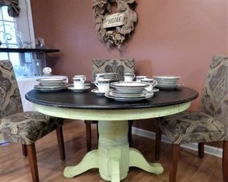 Distressed pedestal dining table