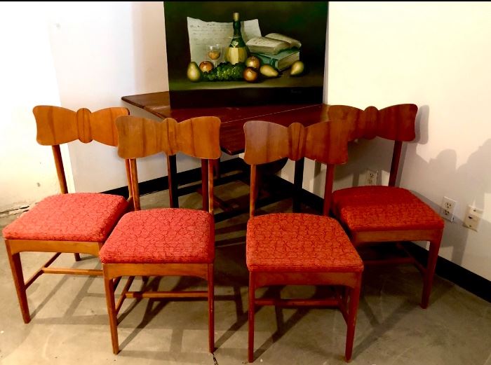Awesome set of 4 Mid-Century solid wood chairs. Very sturdy and still have the original coral fabric with metallic threads! Excellent condition.