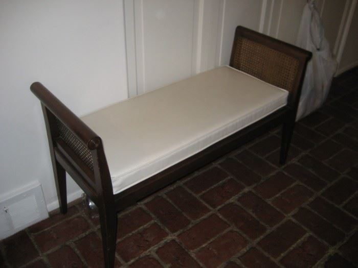 Caned bench with cushion