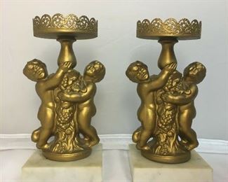 https://www.ebay.com/itm/124165911972	BR029: Metal Cherub Candle Holders with Marble Base, 2 pieces 7.5"x3.5"

