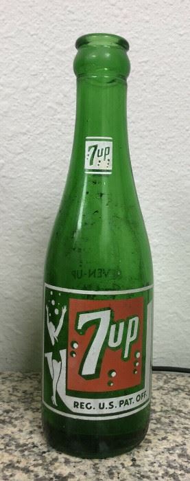 https://www.ebay.com/itm/124167153913	LAN9919: 7 Up Bottle Green 7 Oz 
