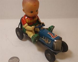 https://www.ebay.com/itm/124181809449	BU3037 VINTAGE 1950s TIN PRESSED METAL FRICTION TOY #7 ROADSTER WITH BOY DRIVER MADE IN JAPAN PATENT # 30609 BU3037	 Auction 
