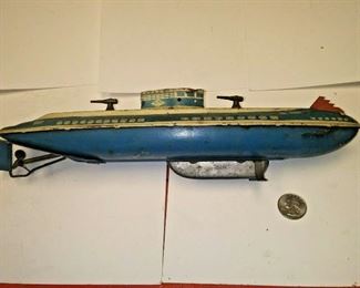 https://www.ebay.com/itm/124205236274	AB0398 RARE USED VINTAGE 1940s WOLVERINE DIVING SUBMARINE S-88 TIN WIND-UP TOY	 Auction 
