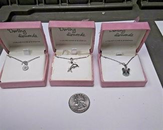 https://www.ebay.com/itm/124233220842	DV3002 LOT OF THREE DARLING DIAMONDS 16 INCH STERLING SILVER CHAINS & FOBS WITH 	 $20.00 
