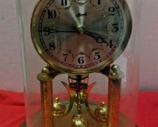 https://www.ebay.com/itm/124377648258	LX3031 10 INCH HIGH USED VINTAGE HERMLE WIND UP BRASS CLOCK WITH GLASS DOME 		 $23.00 	 Buy-It-Now 
